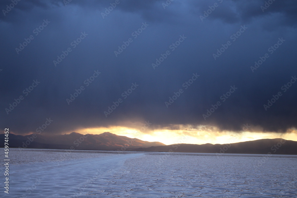 Storm at salt flat desert in northern argentina Storm at salt flat desert in northern argentina