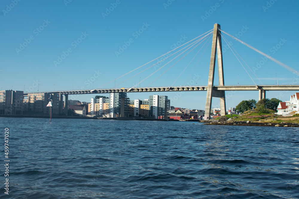 View of downtown Stavanger Norway and bridge from the ocean. Popular cruise destination for accessing famous Trolltunga and Kjerag Hikes