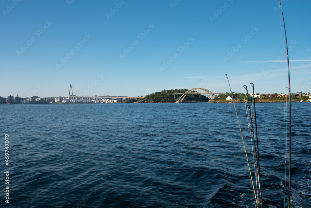 Fishing pole and reel closeup from a boat on the ocean in Stavanger Norway