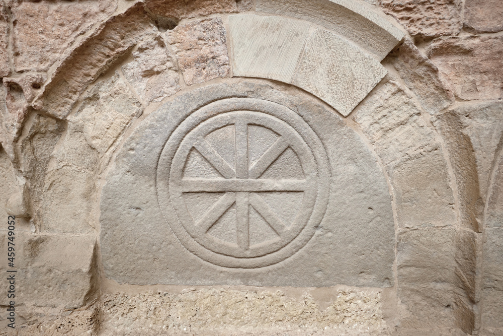 San Juan de la Peña, Aragon September 7, 2021, Wheel in a Sepulcher in the Pantheon of the monastery of San Juan de la Peña