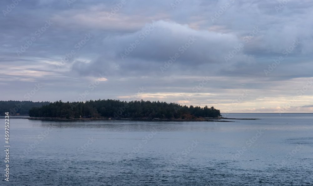 Gulf Islands on the West Coast of Pacific Ocean. Canadian Nature Landscape Background. Summer Sunrise. Near Vancouver Island, British Columbia, Canada. Gulf Islands on the West Coast of Pacific Ocean. Canadian Nature Landscape Background. Summer Sunrise. Near Vancouver Island, British Columbia, Canada.