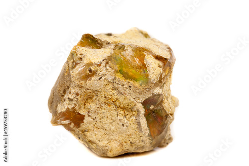 Macro Opal mineral stone in rock on white background