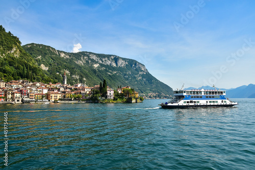Obraz na płótnie the beautiful town of Varenna, a ferry in Lake Como, Italy w salonie