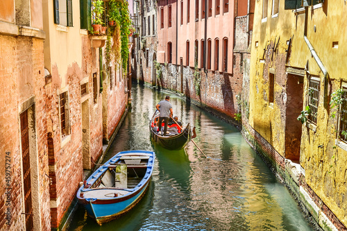 Gondola cruise on the canal in Venice, typical architecture of Italy © VinyLove Foto