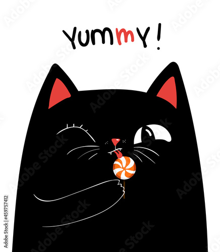 cute black cat eating candies on white background