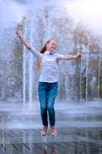 Girl and dry fountain. Childhood. Running on water. Emotions.