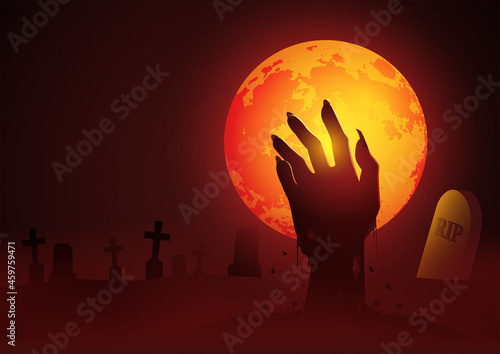 Zombie hand rising out from the grave