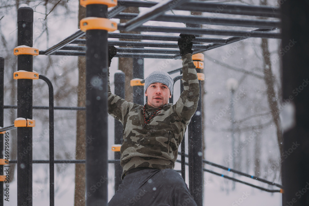 custom made wallpaper toronto digitalTraining outside in winter in a snowfall. a man moves along the handle in a snowstorm