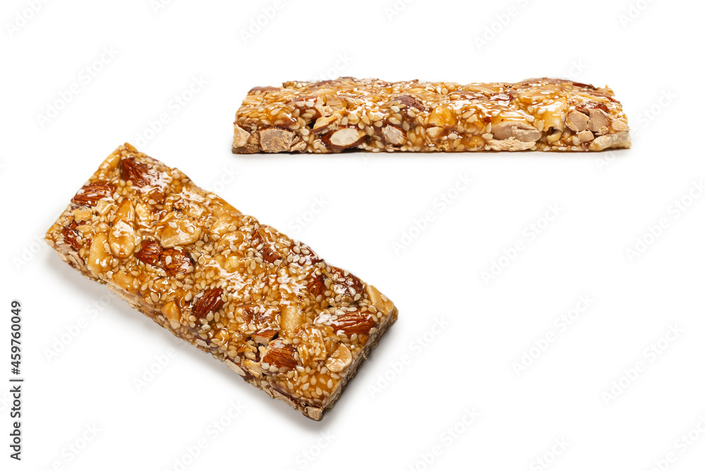 Bar with mix of nuts isolated on a white background. Bar with mix of nuts isolated on a white background.