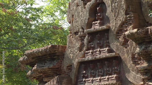 Religious figures praying in a archaeological temple asiatic monument photo