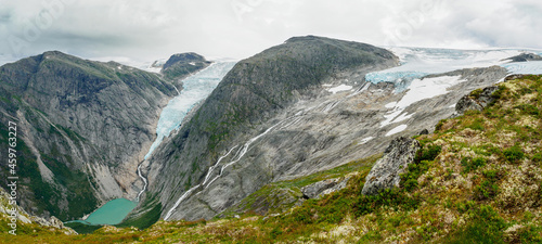 Briksdalbreen glacier and its lagoon from Kattanakken, Jostedalsbreen National Park, Norway. photo