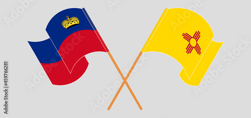 Crossed and waving flags of Liechtenstein and the State of New Mexico
