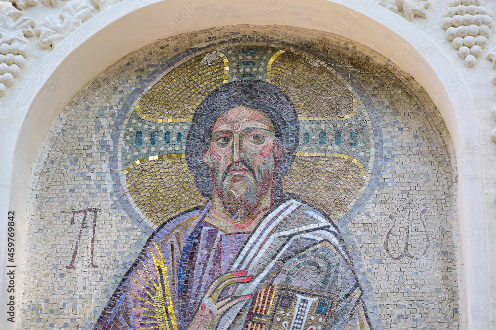 Mosaic with a religious image on the wall of the monastery