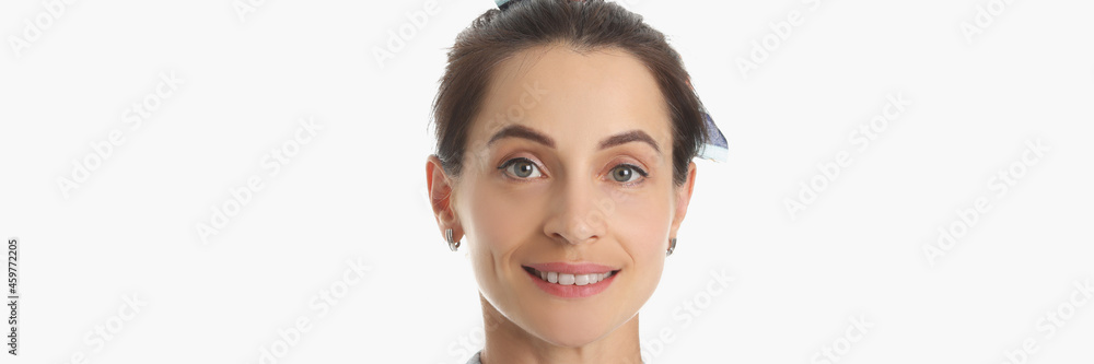 Obraz premium Portrait of young beautiful woman in blue jacket