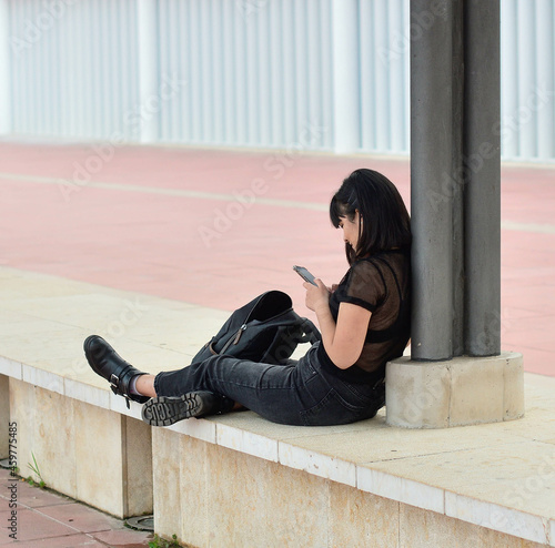 person sitting on stairs