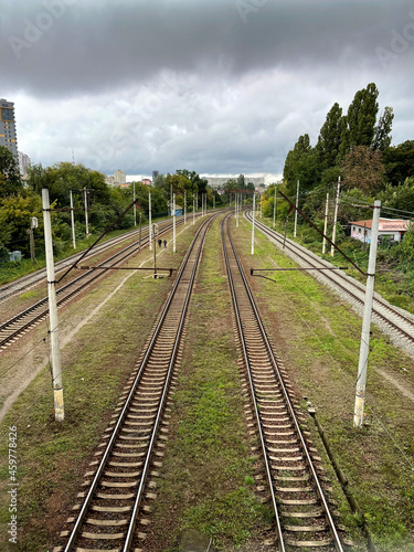Vertical top shot of railroad tracks in the grass