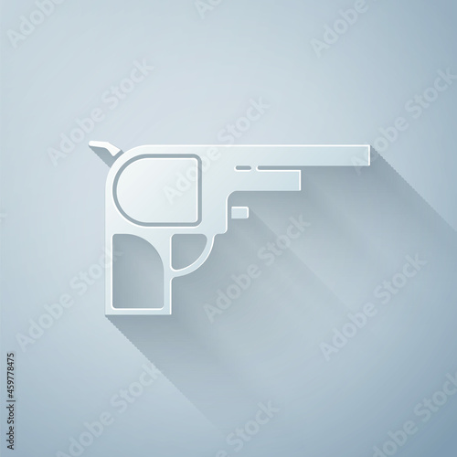 Paper cut Revolver gun icon isolated on grey background. Paper art style. Vector