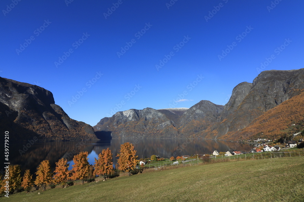Aurlandsfjord with the fjord village Undredal in fall.