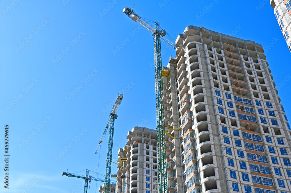 Crane and highrise construction site