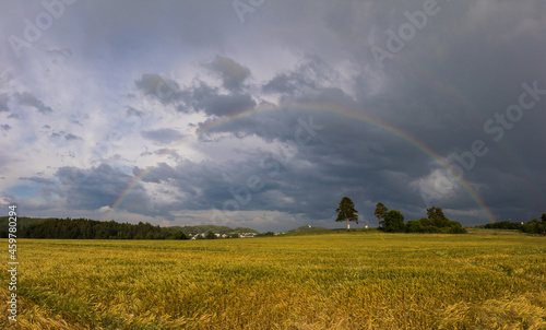 Thunderstorm with double rainbow over Sulzbach Rosenberg city photo
