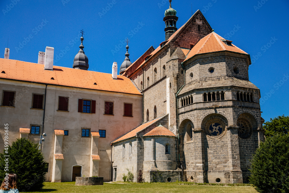 Trebic, Bohemia, Czech Republic, 06 July 2021: medieval castle with museum in historic center, St. Procopius basilica and monastery Romanesque Gothic style, Benedictine herb garden, sunny summer day