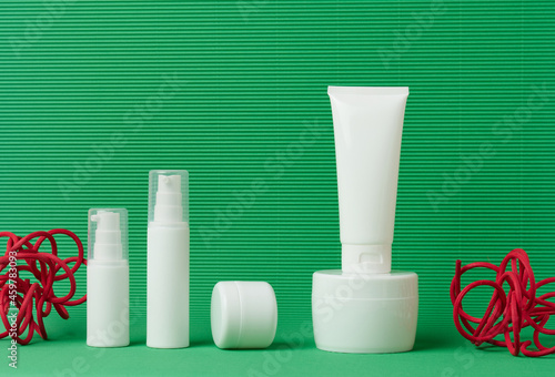 jar, bottle and empty white plastic tubes for cosmetics. Packaging for cream, gel, serum, advertising and product promotion, mock up