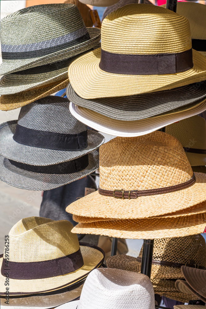 a selection of hats outside a shop
