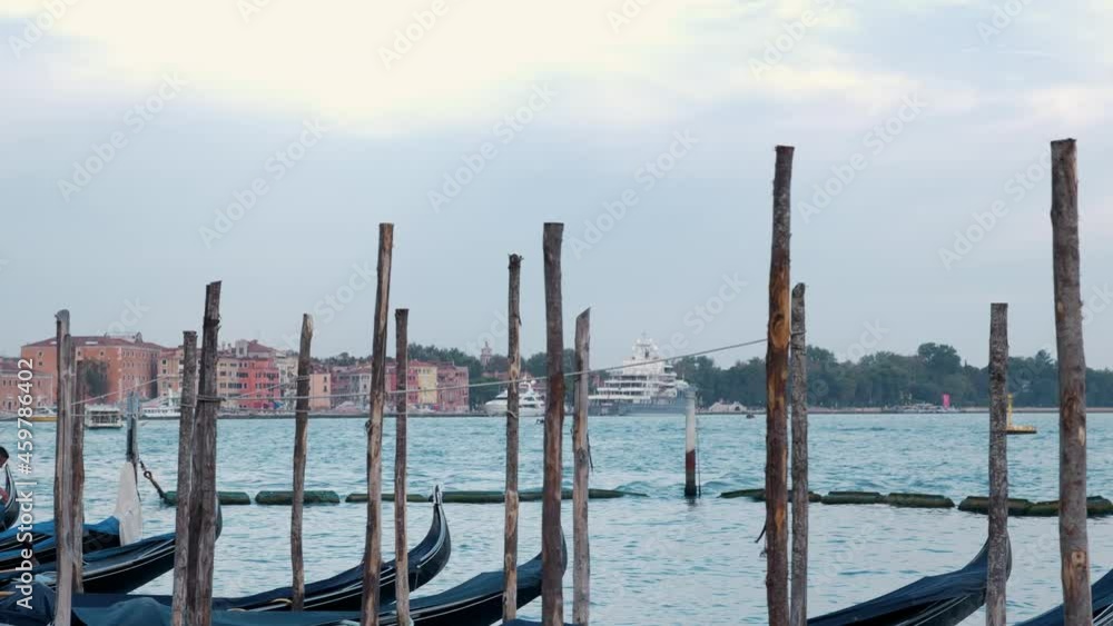 Gondolas on the water in Venice on a calm afternoon Gondolas on the water in Venice on a calm afternoon
