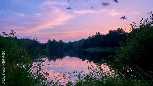 Timelapse of sunset over the Forest Lake, Morshyn, Ukraine photo