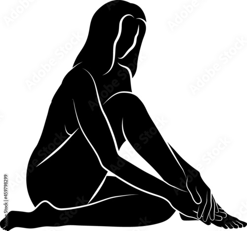 sitting woman massaging her foot
