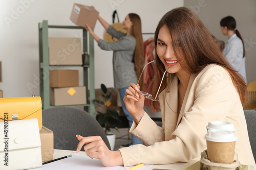 Female business owner proce...