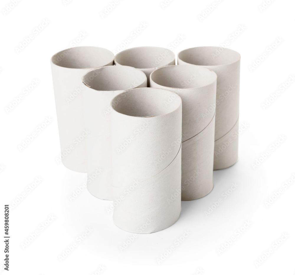 Empty cardboard toilet paper tubes on white background Empty cardboard toilet paper tubes on white background