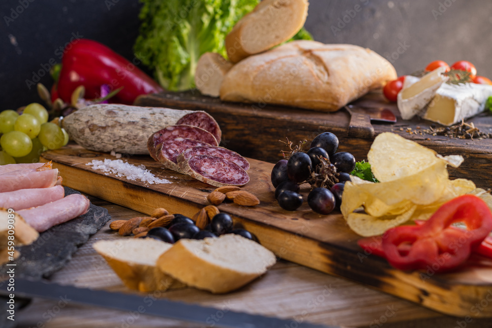 minced board with meat sausages salami cheese almonds and fruit minced board with meat sausages salami cheese almonds and fruit