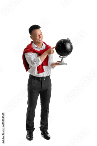 Portrait of Asian teacher with globe on white background