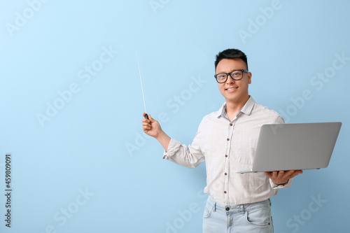 Portrait of Asian teacher w...