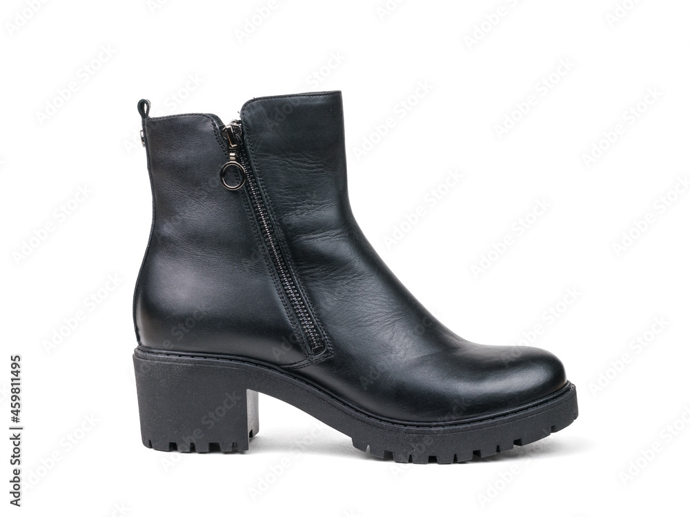 Elegant women's leather black ankle boots isolated on a white background.