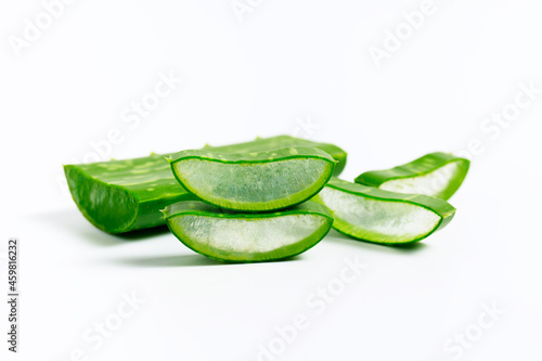 Fresh natural Aloe vera slice on white background. Concept for herbal medicine for skincare and hair care.