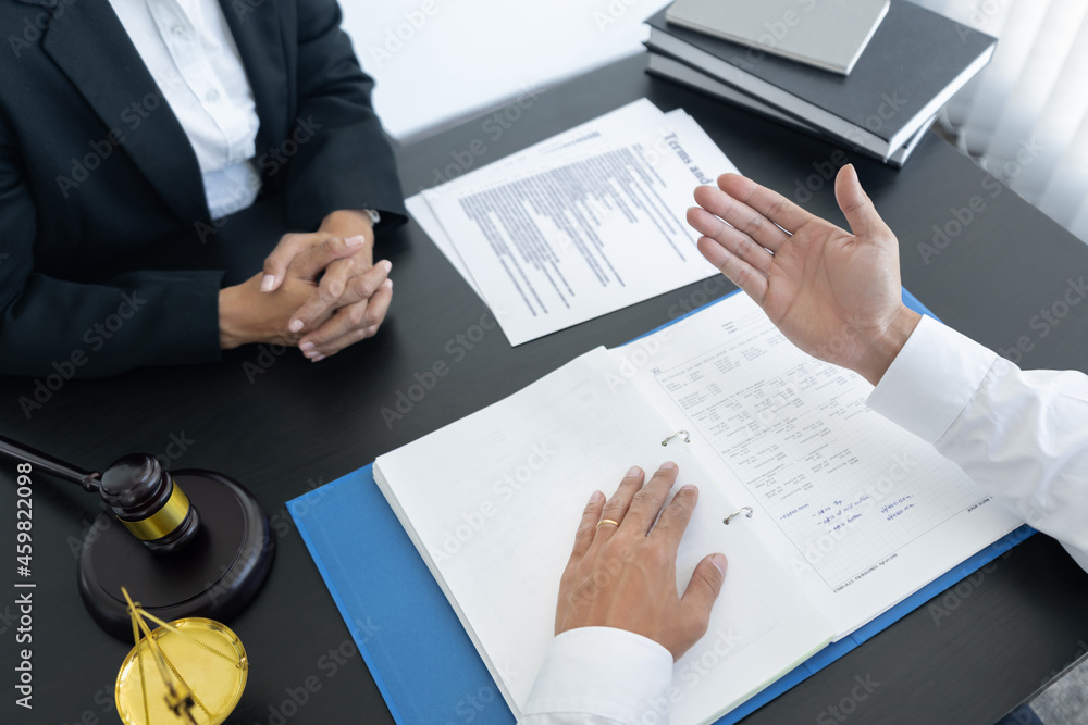a lawyer checking the correctness in contract used in real estate transaction a lawyer checking the correctness in contract used in real estate transaction
