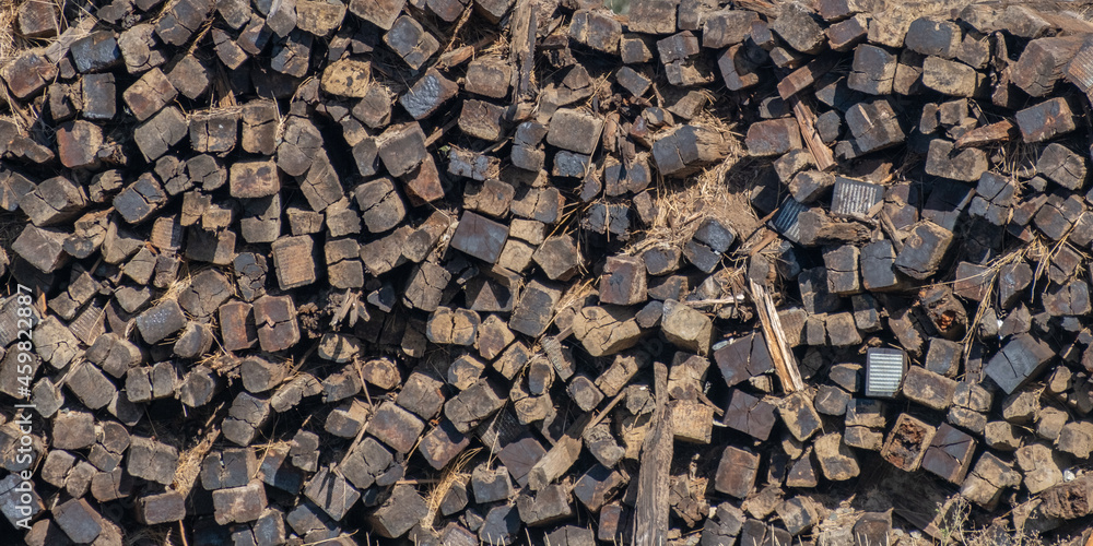 Pile of wood beside the road in rural Alberta Pile of wood beside the road in rural Alberta