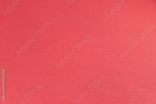 texture of colored cotton fabric. pink fabric background. seamless pattern of textile