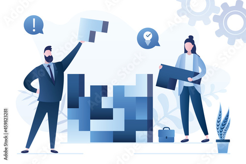 Business logic. Entrepreneurs collects complex puzzle from different cubes. New project management. Team or company building. Group of confident managers successfully solves business problems