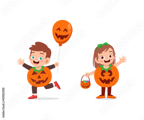 boy and girl celebrate halloween wear pumpkin costume