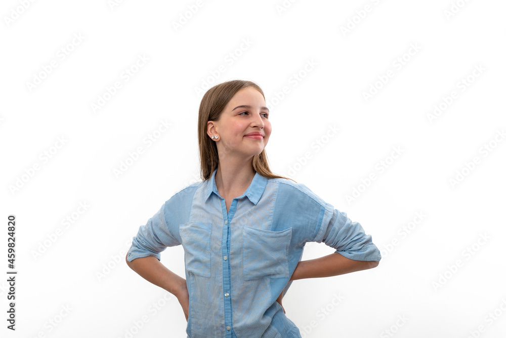 Studio shot of a teenage girl with dynamic light stripes holding hands at waist, isolated Studio shot of a teenage girl with dynamic light stripes holding hands at waist, isolated