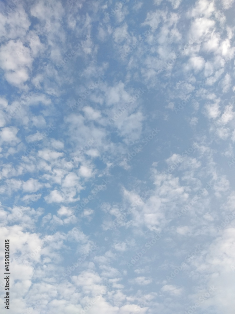 Photo of blue sky with clouds.