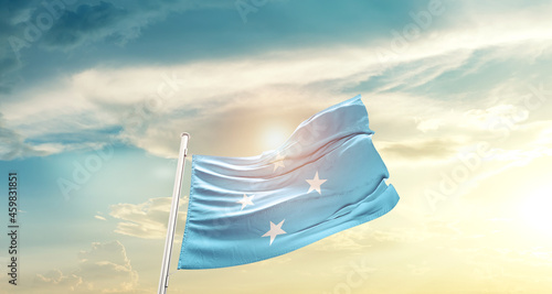 Micronesia national flag cloth fabric waving on the sky - Image