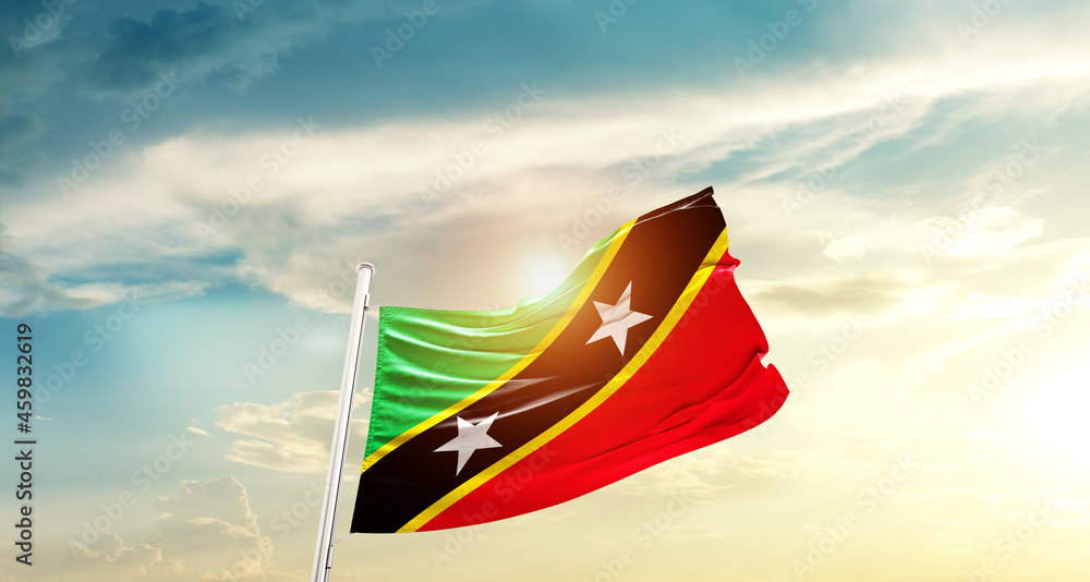Saint Kitts and Nevis national flag cloth fabric waving on the sky - Image