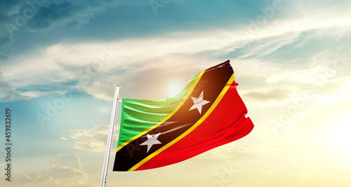 Saint Kitts and Nevis national flag cloth fabric waving on the sky - Image