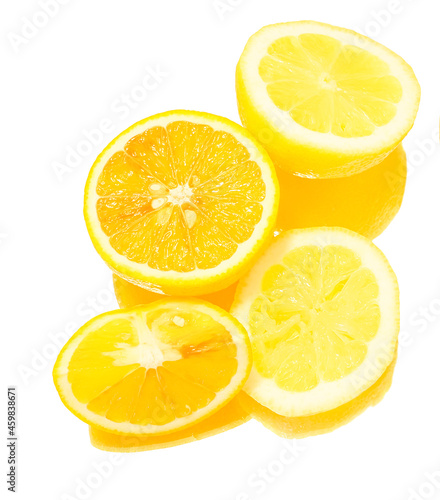 slices of orange and lemon on white background.