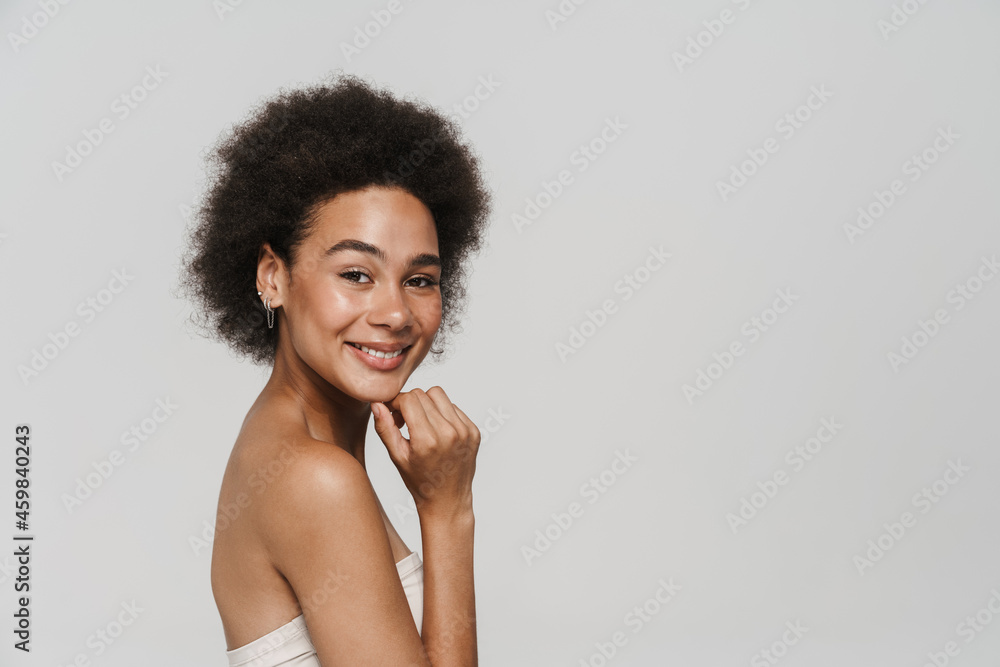 Black brunette woman smiling and looking at camera Black brunette woman smiling and looking at camera