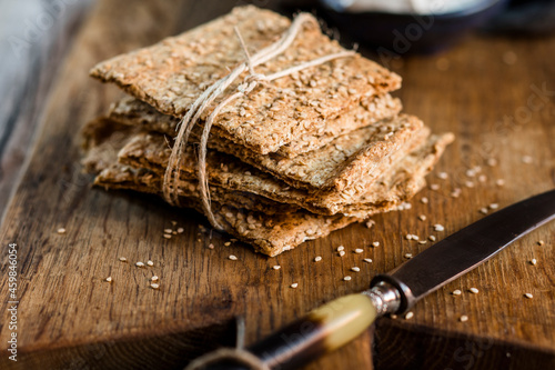 Bundle of fresh gluten-free crispbreads with flax seed photo